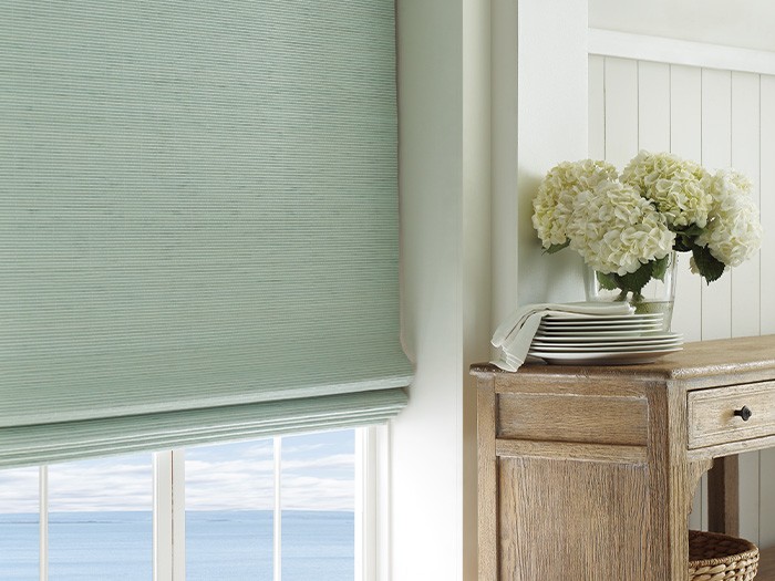 Window featuring Provenance® Woven Wood Shades.